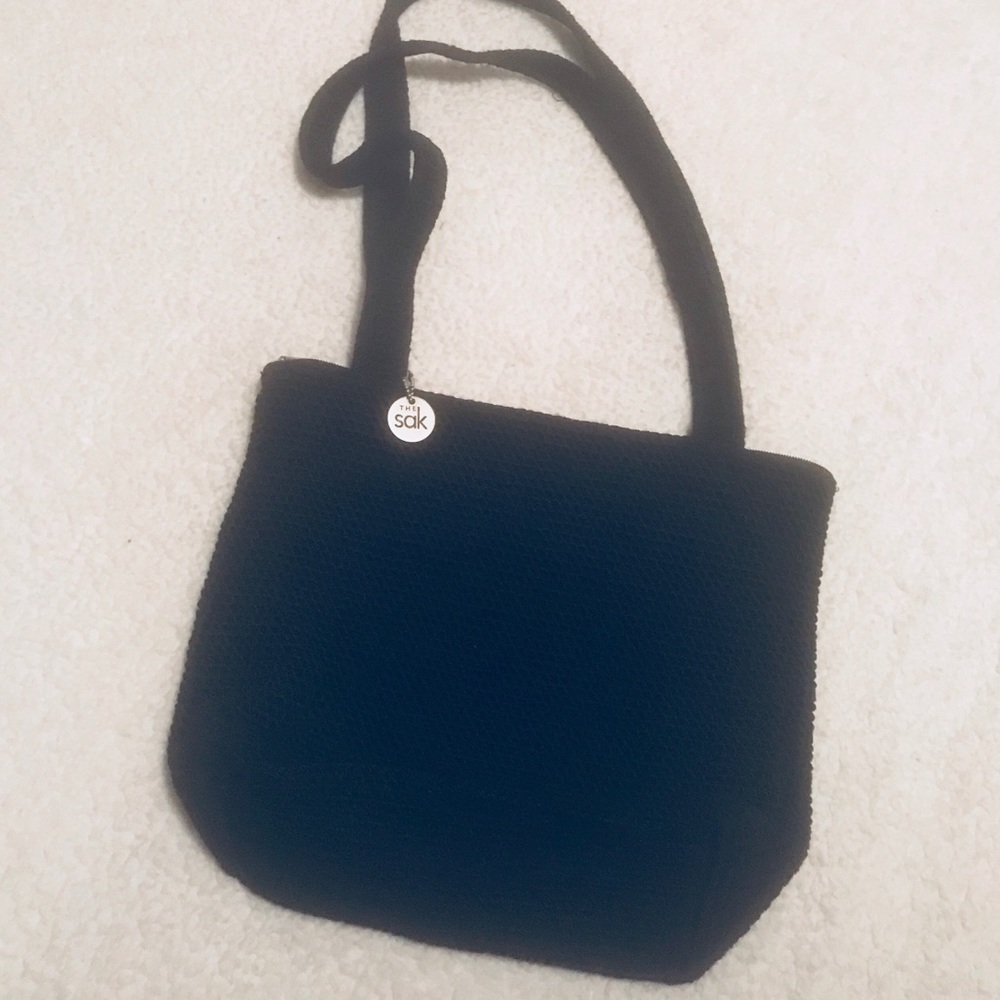 The SAK Black knitted woven shoulder bag purse